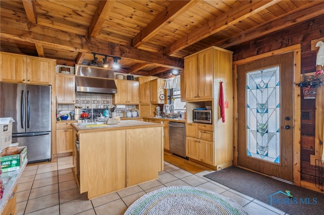 kitchen with wall chimney range hood, a kitchen island, appliances with stainless steel finishes, wooden ceiling, and light tile patterned flooring