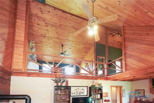 room details featuring a ceiling fan and wood ceiling
