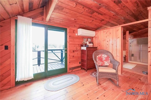sitting room with lofted ceiling, wooden walls, a wall unit AC, wooden ceiling, and light wood-style flooring