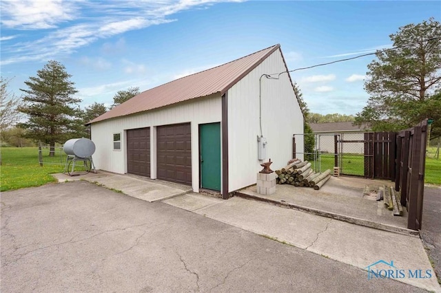 detached garage with fence