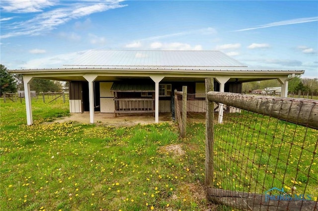 surrounding community featuring an exterior structure and an outdoor structure