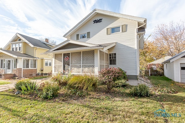 view of front of home with a front yard