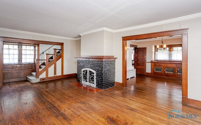 living room featuring crown molding and dark hardwood / wood-style floors