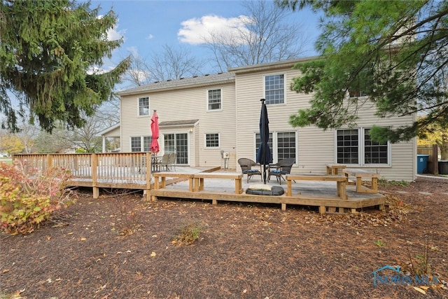 rear view of property with a deck