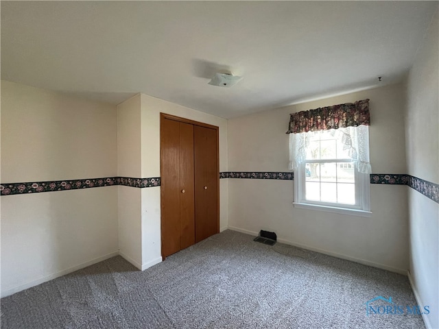 empty room featuring carpet