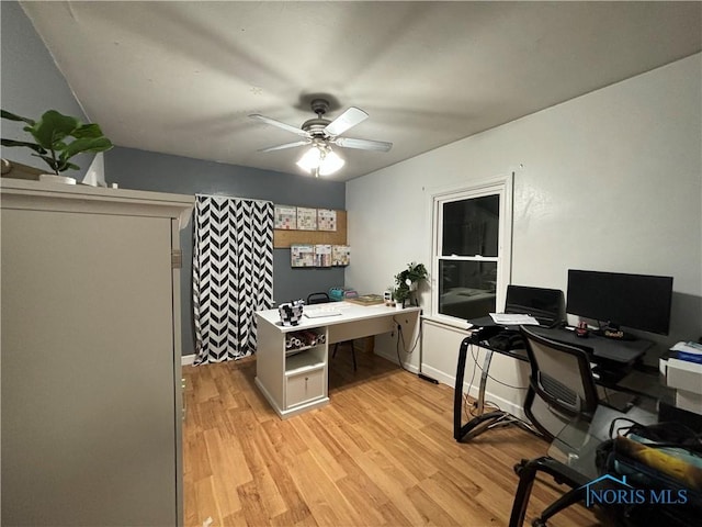 office area featuring ceiling fan and light hardwood / wood-style floors