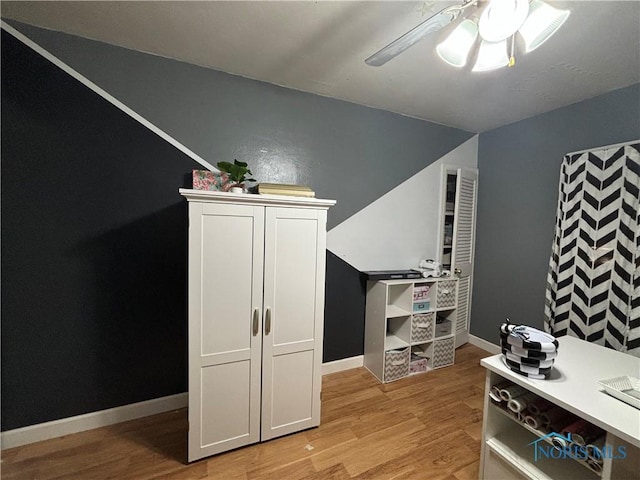 interior space with ceiling fan and light wood-type flooring