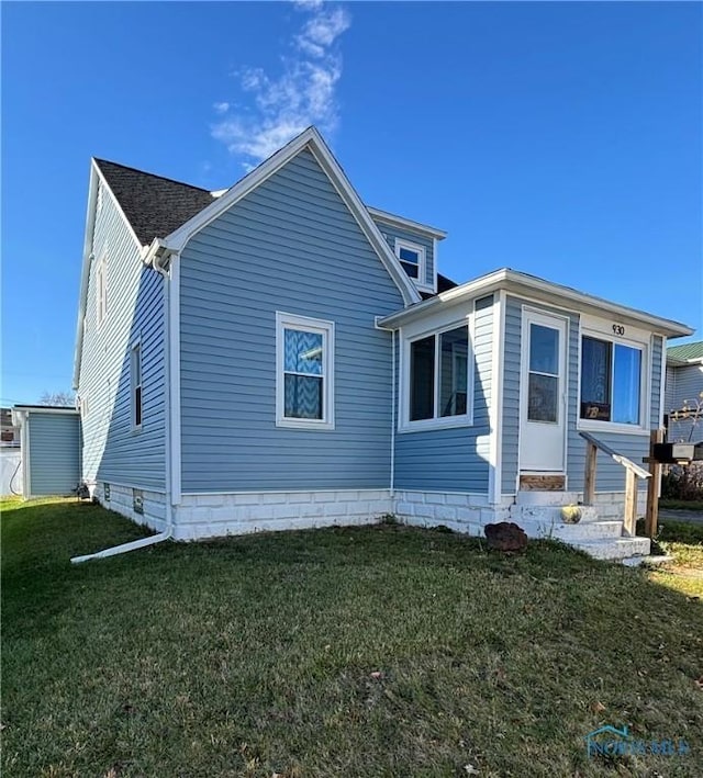 exterior space with a lawn