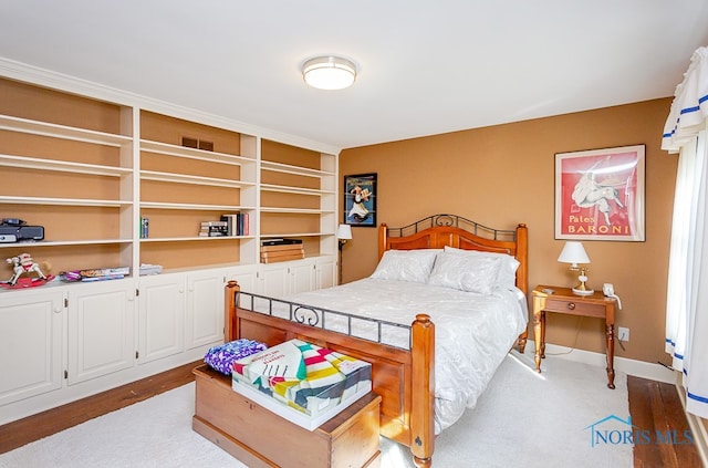 bedroom featuring light hardwood / wood-style flooring