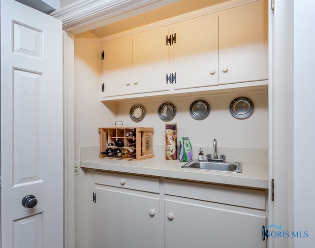 bar featuring sink