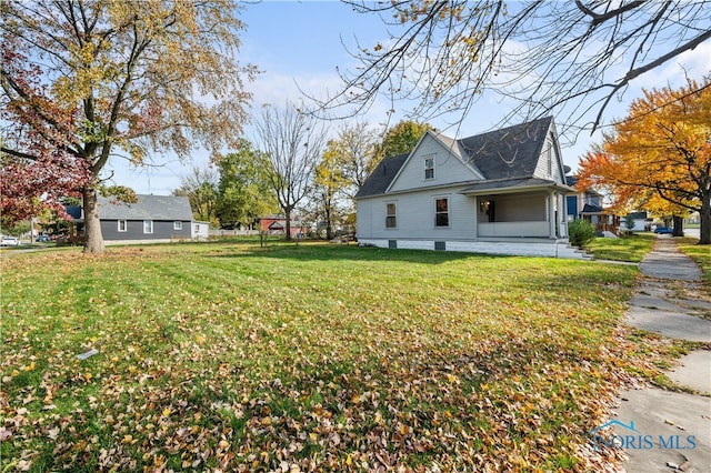 view of property exterior featuring a yard