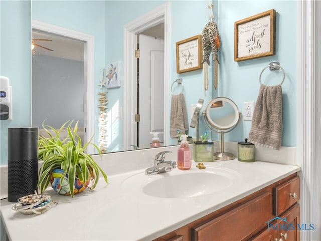 bathroom featuring vanity and ceiling fan