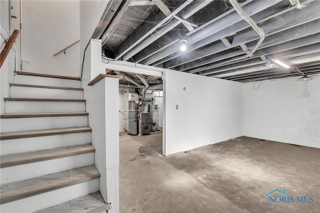 basement featuring gas water heater