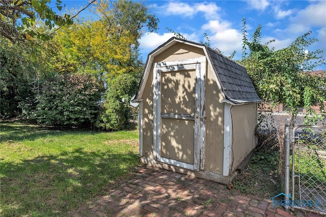 view of outdoor structure with a yard