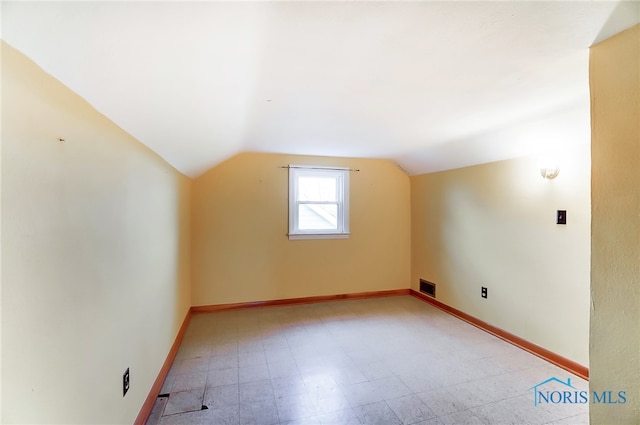 bonus room with lofted ceiling