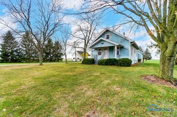 view of front of property with a front lawn