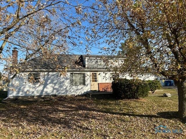 1811 E Wilson, Bryan, OH 43506 - view of front of house featuring a chimney