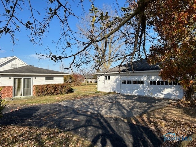 exterior space featuring a garage