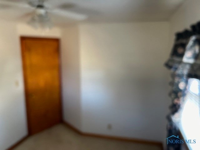 unfurnished bedroom with ceiling fan