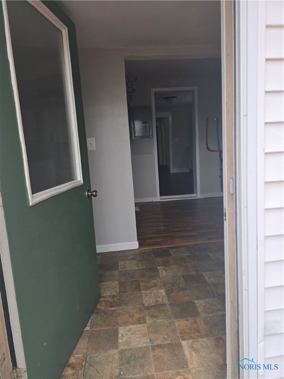 hallway with electric panel