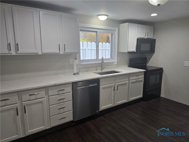 kitchen with white cabinetry, black appliances, sink, and dark hardwood / wood-style floors