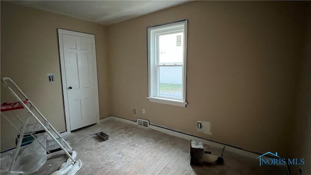 221 W Jackson St, Paulding, OH 45879 - unfurnished room featuring baseboards