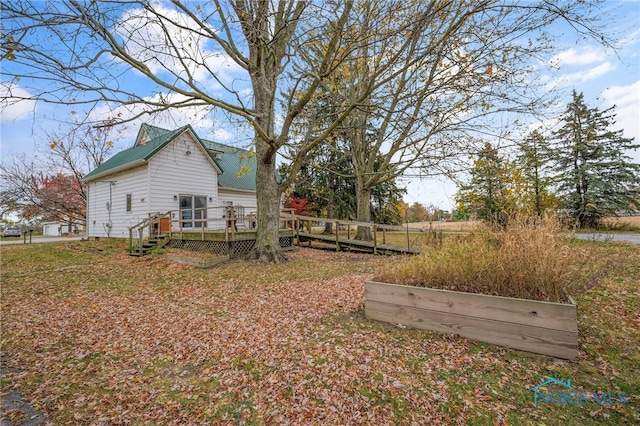 view of yard with a deck