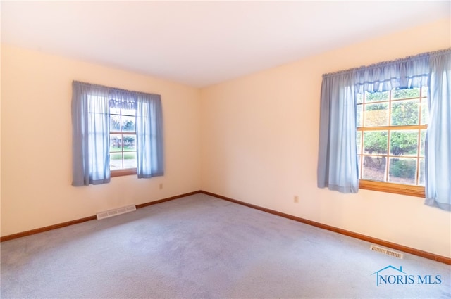 view of carpeted spare room