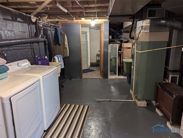 basement with separate washer and dryer