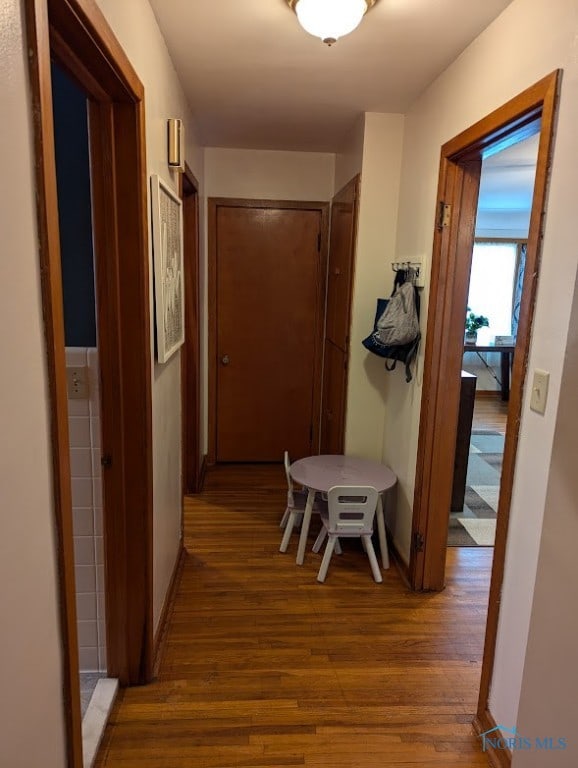 hallway featuring hardwood / wood-style floors