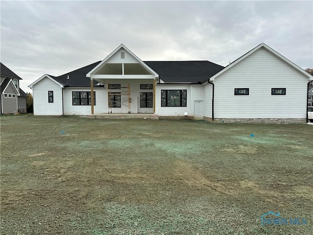 3640 Turtle Creek Dr, Perrysburg, OH 43551 - view of front of house featuring covered porch