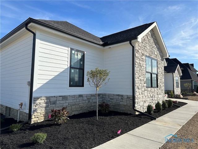 3640 Turtle Creek Dr, Perrysburg, OH 43551 - view of home's exterior with stone siding