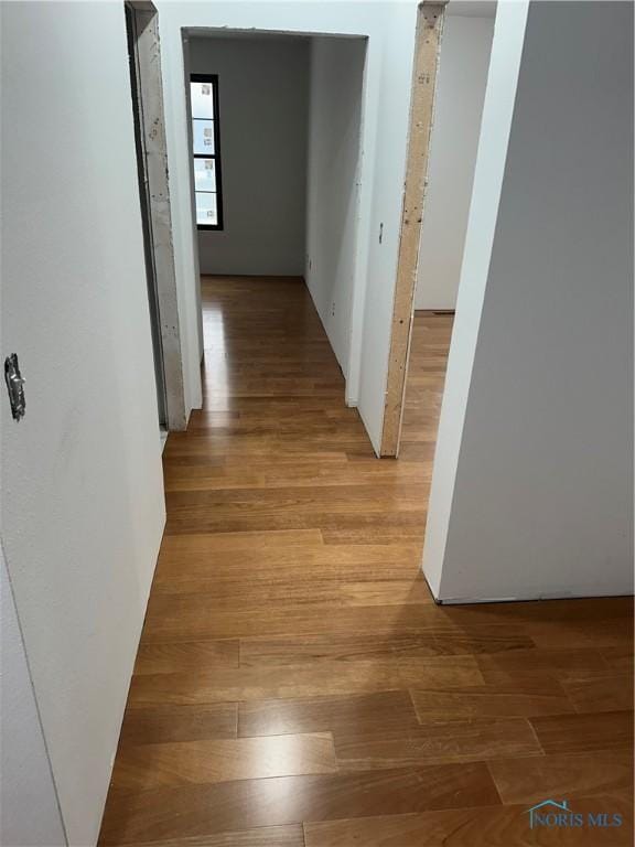 hallway featuring light wood-type flooring