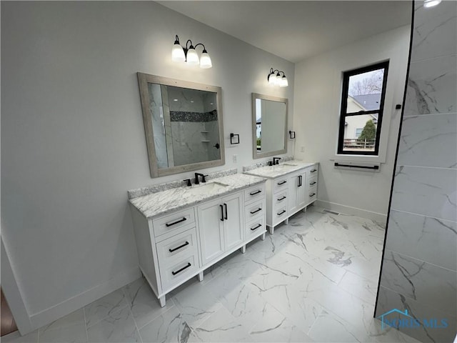 3640 Turtle Creek Dr, Perrysburg, OH 43551 - bathroom with marble finish floors, baseboards, two vanities, and walk in shower