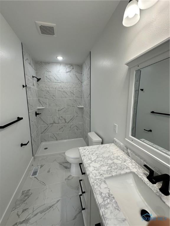 3640 Turtle Creek Dr, Perrysburg, OH 43551 - bathroom with tiled shower, toilet, vanity, marble finish flooring, and baseboards