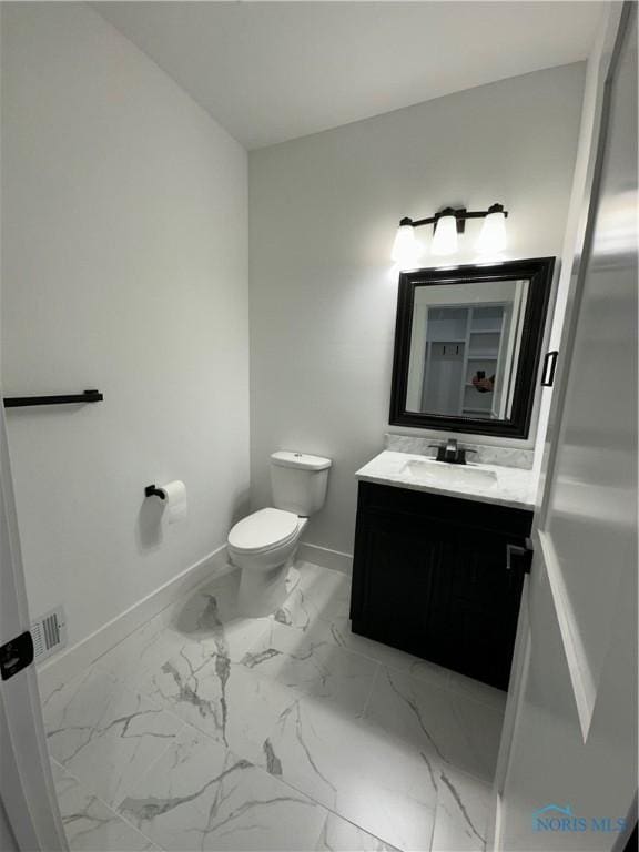 3640 Turtle Creek Dr, Perrysburg, OH 43551 - half bath featuring marble finish floors, baseboards, toilet, and vanity
