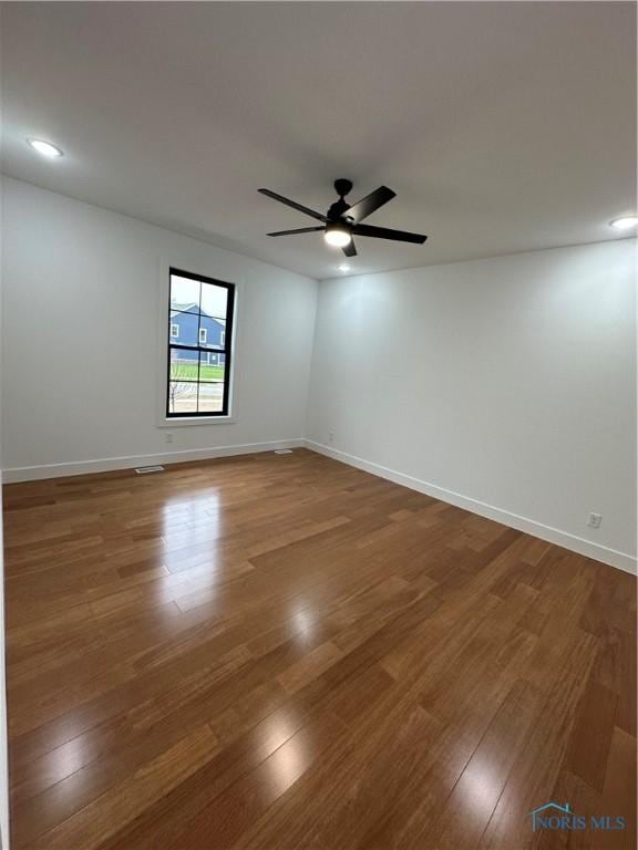 3640 Turtle Creek Dr, Perrysburg, OH 43551 - empty room with a ceiling fan, wood finished floors, baseboards, and recessed lighting