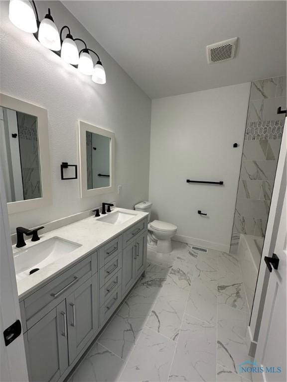 3640 Turtle Creek Dr, Perrysburg, OH 43551 - full bathroom with marble look tile flooring, toilet, and double vanity