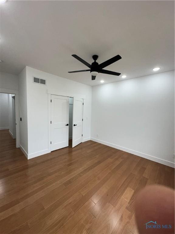 3640 Turtle Creek Dr, Perrysburg, OH 43551 - spare room with a ceiling fan, baseboards, wood finished floors, and recessed lighting