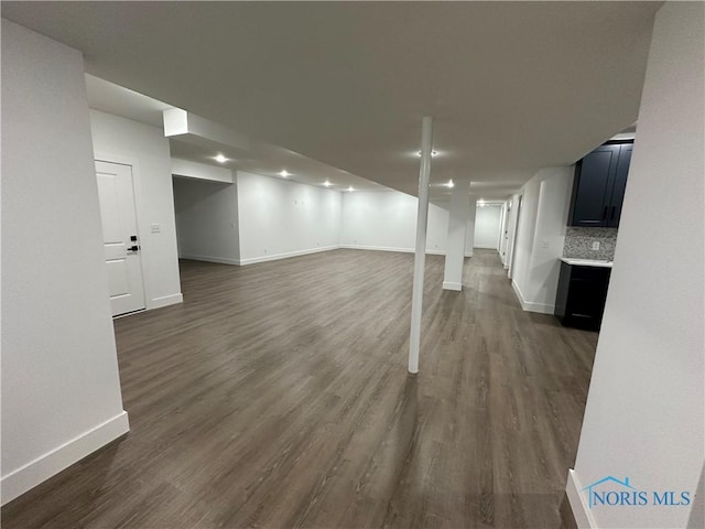 3640 Turtle Creek Dr, Perrysburg, OH 43551 - finished basement featuring baseboards and dark wood-type flooring
