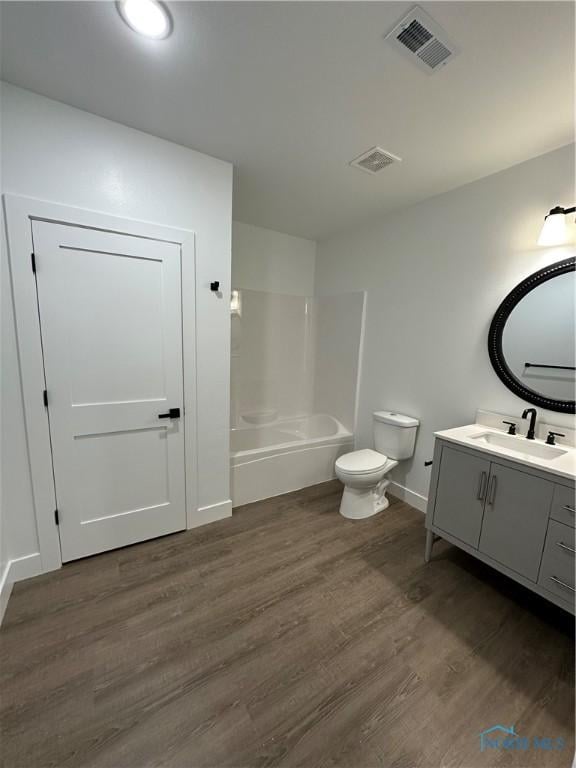 3640 Turtle Creek Dr, Perrysburg, OH 43551 - full bathroom featuring toilet, wood finished floors, vanity, baseboards, and shower / bathtub combination