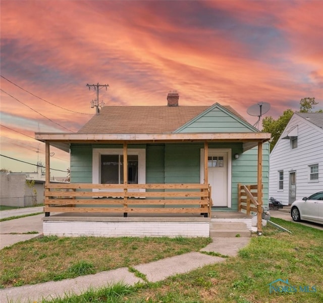 bungalow-style home featuring covered porch