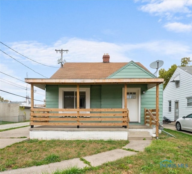 bungalow-style home featuring a porch