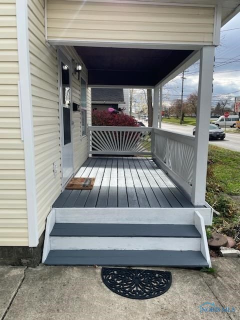 deck with covered porch