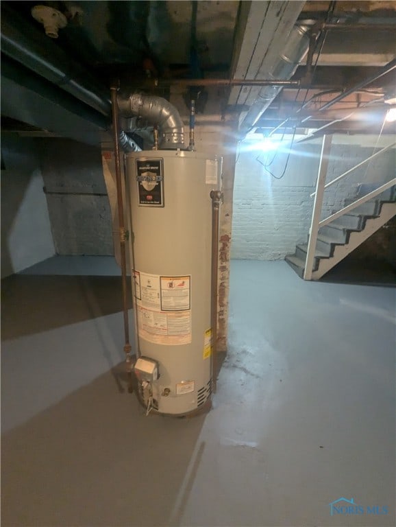 basement featuring gas water heater