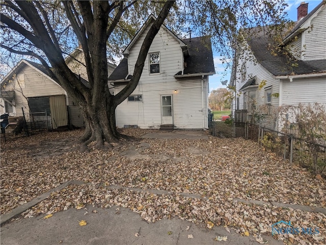 back of property with a patio area