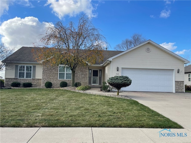 ranch-style home with a garage and a front yard