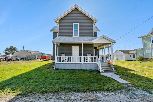 exterior space with a porch and a lawn