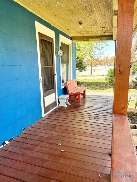 wooden deck featuring a porch