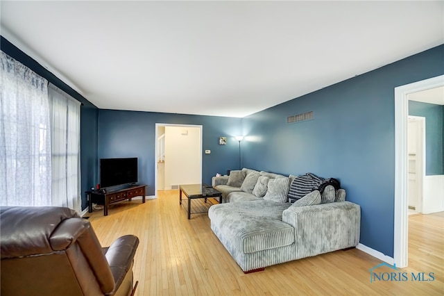 living room featuring hardwood / wood-style floors